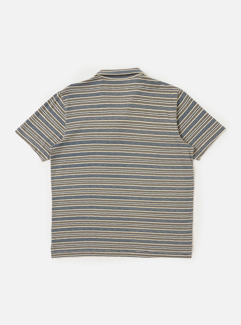 The Grey OS Stripe Jersey Vacation Polo is shown from the back, laid flat against a plain white background. The image highlights the horizontal stripe pattern in grey and white, the straight hem with side vents, and the back of the single-piece collar.