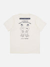 The Paraboot x Universal Works Ecru Single Jersey Short Sleeve Tee, laid flat on a white surface. The back features a graphic print. 