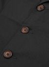 Close up of the Black Twill London Jacket showing the texture of the twill fabric and the brown buttons.
