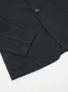 Close up of the Black Twill London Jacket on a white background. Shows the fabric texture, button, pocket and sleeve detail.
