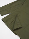Close-up of the Light Olive Twill London Jacket on a white surface. Shows the twill texture and tailored details.