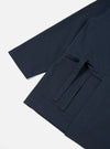 Close-up of the Navy Twill Kyoto Work Jacket on a white background. Shows the jacket's sleeve, pocket, and tie detail.