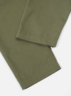Close-up of the light olive twill Military Chino pants on a white background, showcasing the fabric and fit.