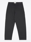 Studio shot of the Black Twill Curved Pant laid flat on a white background. The pants are a dark, solid color and made of twill fabric.