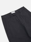 Close-up of the Black Twill Curved Pant on a white background. The twill fabric is visible, showcasing the curved fit and design details.
