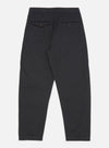 Back view of the Black Twill Curved Pant on a white background. The pants are a dark color and made of twill fabric, featuring a curved fit.