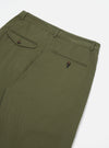 Close-up of the Light Olive Twill Curved Pant on a white background. Details include the twill fabric, curved fit, and buttoned pockets.