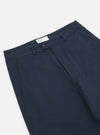 Close-up of the Navy Twill Curved Pant on a white background. The twill fabric is a deep navy. The pants have a curved fit.
