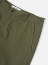 Close-up of the Light Olive Twill Aston Pant on a white background. Details include the twill fabric, button closure, belt loops, and pocket.