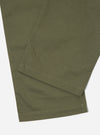 Close-up of the light olive twill Fatigue Pant (Undarted) on a white background, showing the texture and hem.
