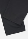 Close-up of the Black Twill Double Pleat Pant on a white background, showcasing the fabric and pleat details.