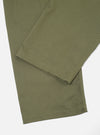 Close-up of the Light Olive Twill Double Pleat Pant on a white surface. The twill fabric and double pleat construction are clearly visible.