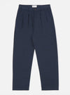 The Navy Twill Double Pleat Pant, in navy twill, is laid out on a white background. The pants have a relaxed fit and double pleats at the waist.