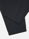 Close-up of the Black Twill Pleated Track Pant on a white background. The dark twill fabric shows subtle pleats and a comfortable fit.