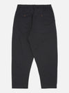 Back view of the Black Twill Pleated Track Pant on a white background. The pants have a relaxed fit and feature two back pockets with button closures.