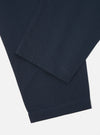 Close-up of the Navy Twill Pleated Track Pant on a white background. The twill fabric is visible, showcasing the texture and color of the pants.
