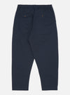 Back view of the Navy Twill Pleated Track Pant on a white background. The pants are a relaxed fit with an elastic waistband and buttoned pockets.