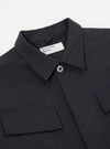 Close-up of the Black Twill MW Fatigue Jacket on a white background. The jacket features a button closure, collar, and chest pockets.
