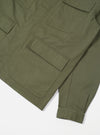 Close-up of the Light Olive Twill MW Fatigue Jacket on a white background. The jacket features a twill fabric and multiple pockets.