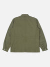 Back view of the Light Olive Twill MW Fatigue Jacket on a white background. The jacket is light olive and made of twill. It has long sleeves and a button-down front.