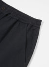 Close-up of Black Twill Hi Water Trouser on a white background. Shows the elasticated waist, drawstring, and pocket detail.