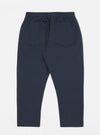 Back view of Navy Twill Hi Water Trouser on a white background. These slim-fit trousers feature an elastic waistband and two back pockets.